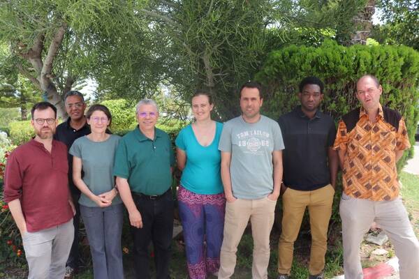 Group photo of scientists outside