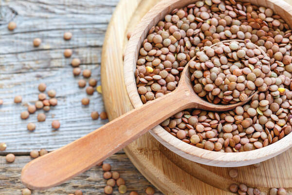 Lentils in a wooden bowl