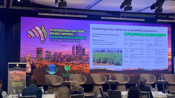 Dr. Maalouf delivering his talk on enhancing protein content in faba bean  Dr. Maalouf delivering his talk on enhancing protein content in faba bean