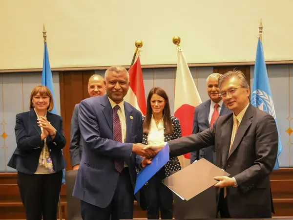 Dr. Nasr El-Din Hag Elamin (left) and H.E. Mr. OKA Hiroshi (right)