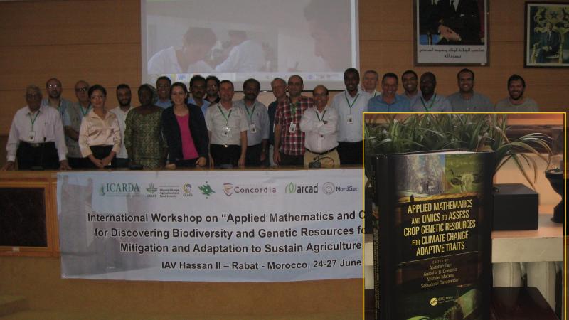 Editors of the book along with the workshop participants; a copy of the book (inset)