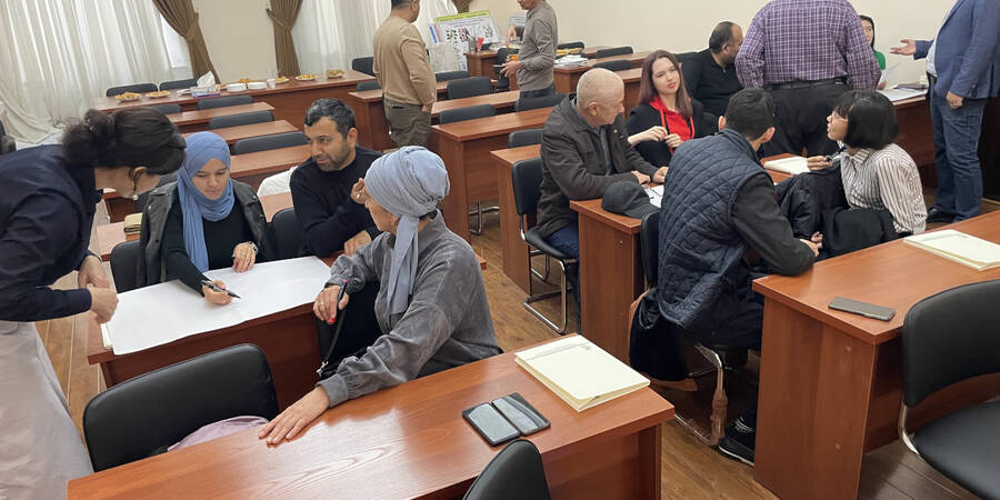 Olga & Sergey participating in a group discussion during an AID-CSB workshop 